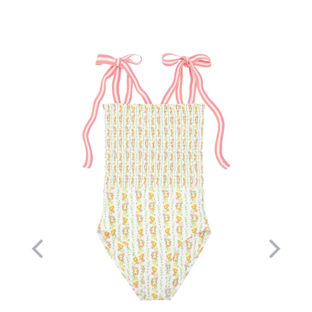 Women’s linear citrus smocked one piece.